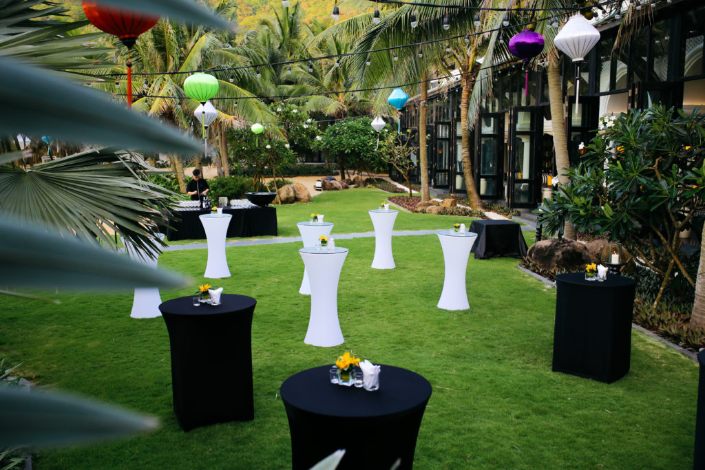 A cocktail party set up on the Long Bar Lawn