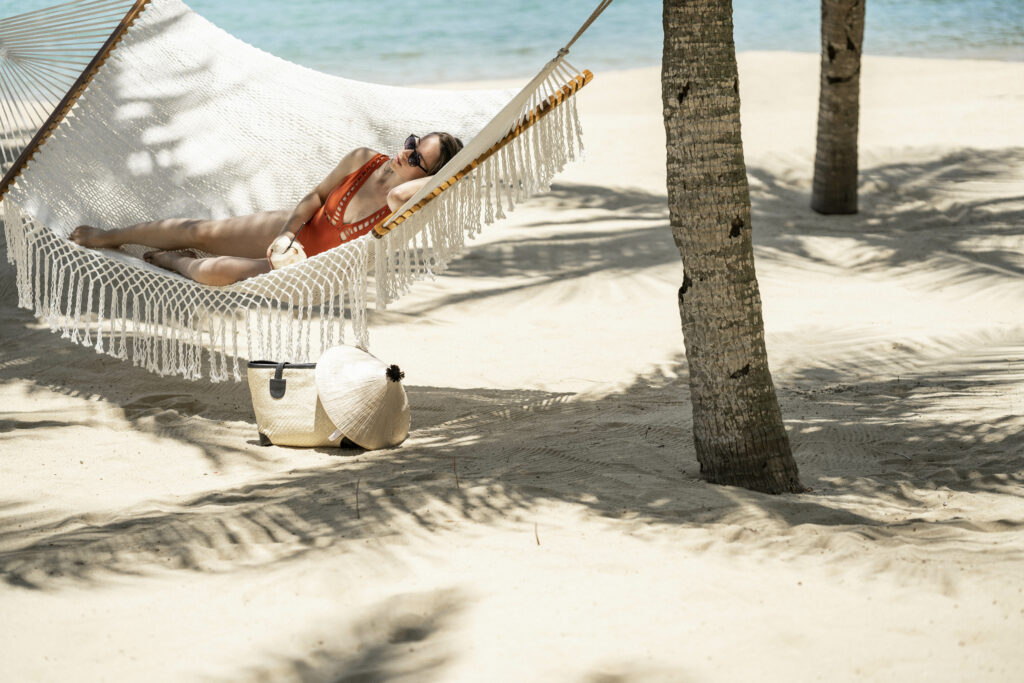 Woman in hammock on InterContinental Danang beach